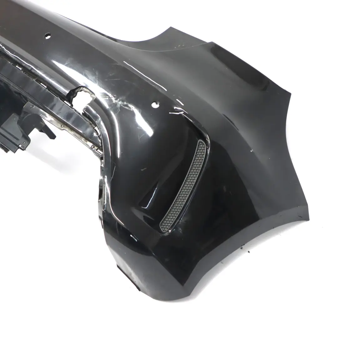 Bumper Rear Trim Panel AMG Kosmos Cosmic Black Metallic - 191 to Mercedes W176 with Part number A1768805840 Mercedes W176 Bumper Rear Trim Panel AMG Kosmos Cosmic Black Metallic - 191 - SKU A1768805840-KB1 - Part number A1768805840