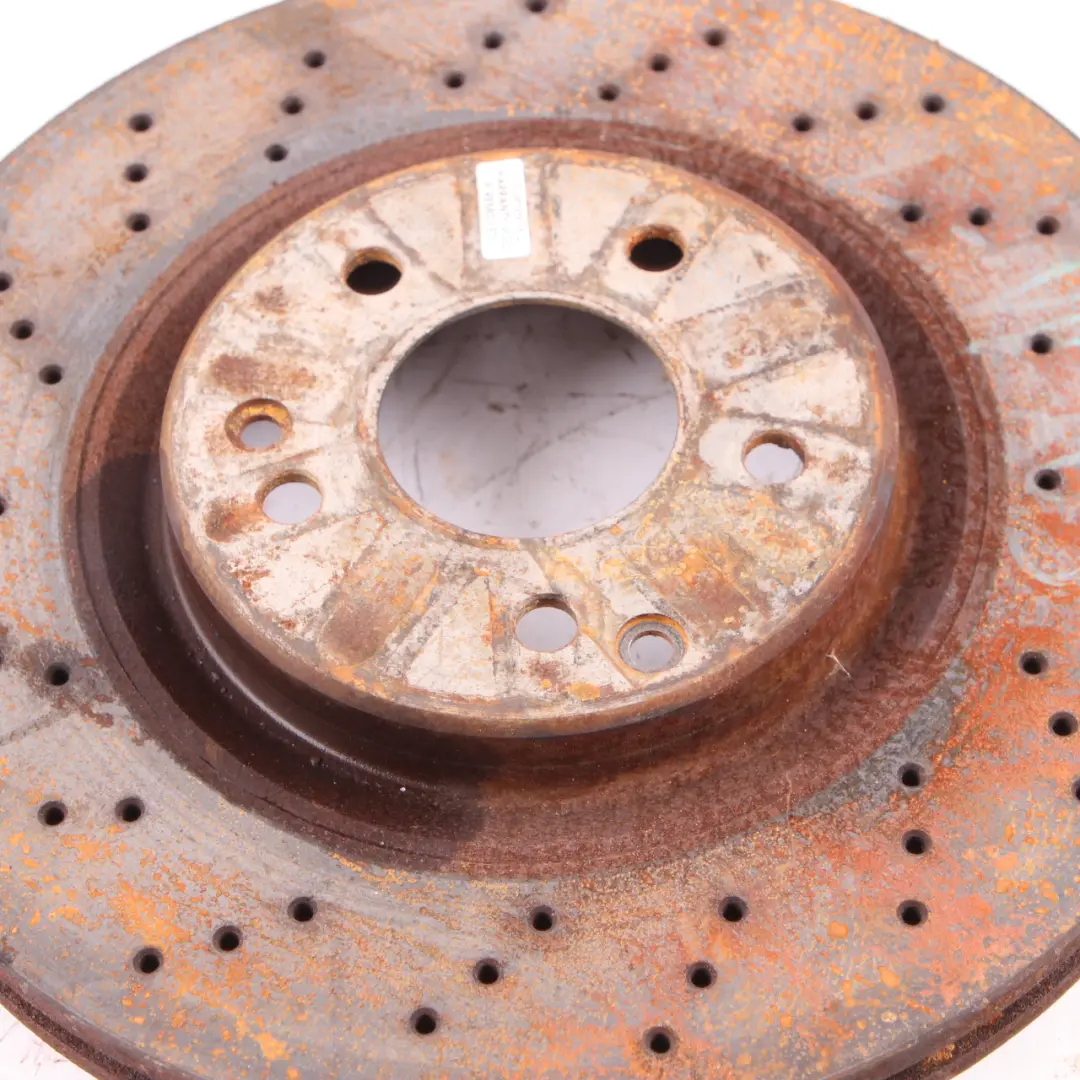 Brake Disc Mercedes W203 W209 Front Left Right Perforated Brake Disc to with Part number A2034210312 Brake Disc Mercedes W203 W209 Front Left Right Perforated Brake Disc - SKU A2034210312 - Part number A2034210312