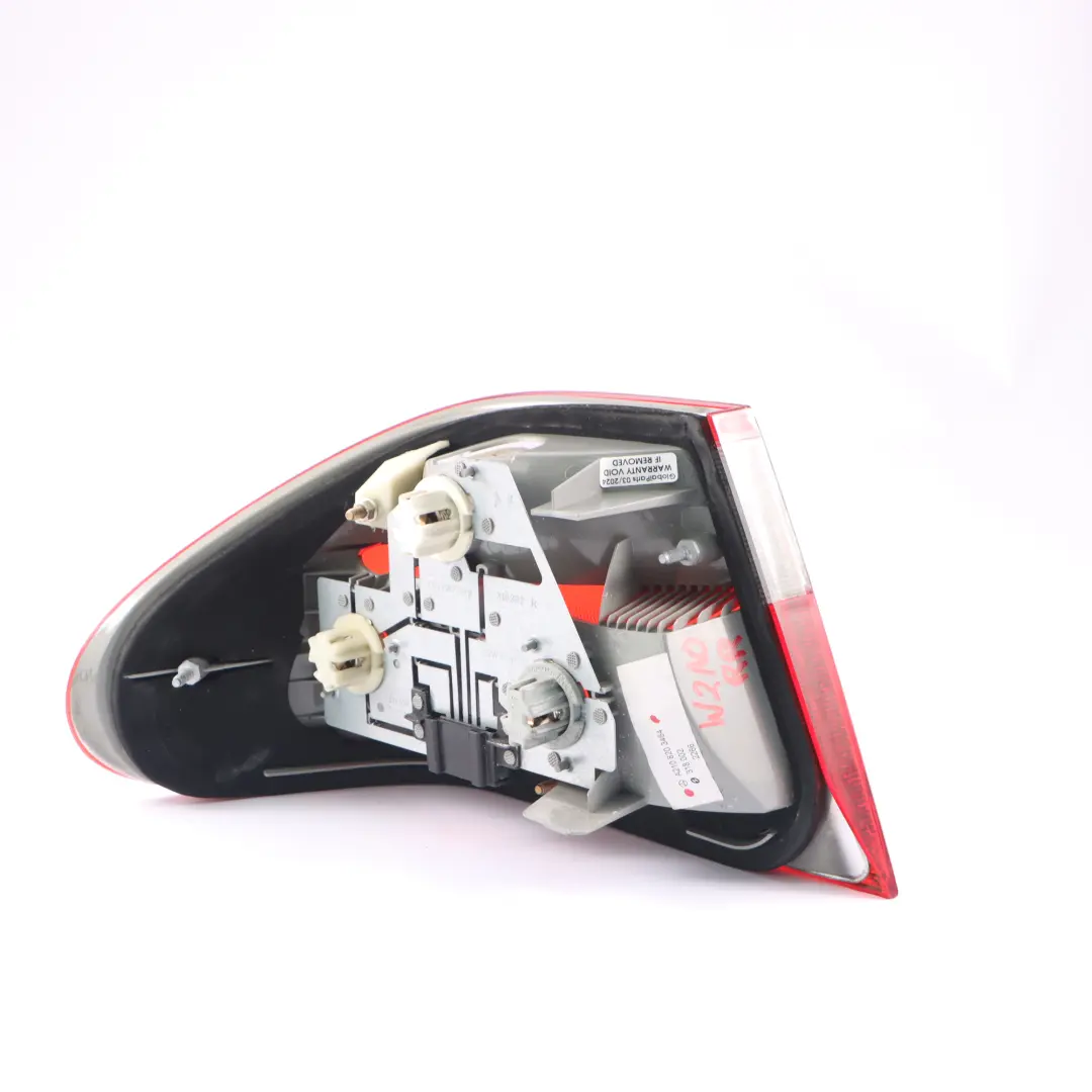 Light Right O/S Tail Lamp Side Panel to Mercedes W210 Saloon Rear with Part number A2108203464 Mercedes W210 Saloon Rear Light Right O/S Tail Lamp Side Panel - SKU A2108203464 - Part number A2108203464