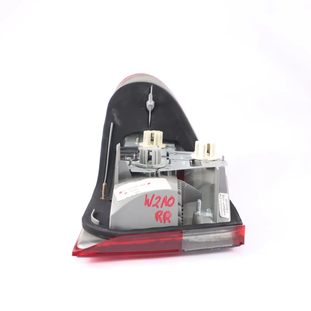 Light Right O/S Tail Lamp Side Panel to Mercedes W210 Saloon Rear with Part number A2108203464 Mercedes W210 Saloon Rear Light Right O/S Tail Lamp Side Panel - SKU A2108203464 - Part number A2108203464