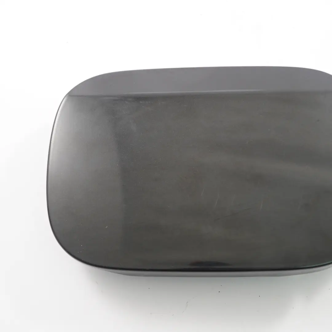 Filler Fill In Flap Cap Cover Obsidian Black Metallic - 197 to Mercedes W211 Fuel with Part number A2117500206 Mercedes W211 Fuel Filler Fill In Flap Cap Cover Obsidian Black Metallic - 197 - SKU A2117500206-OB - Part number A2117500206