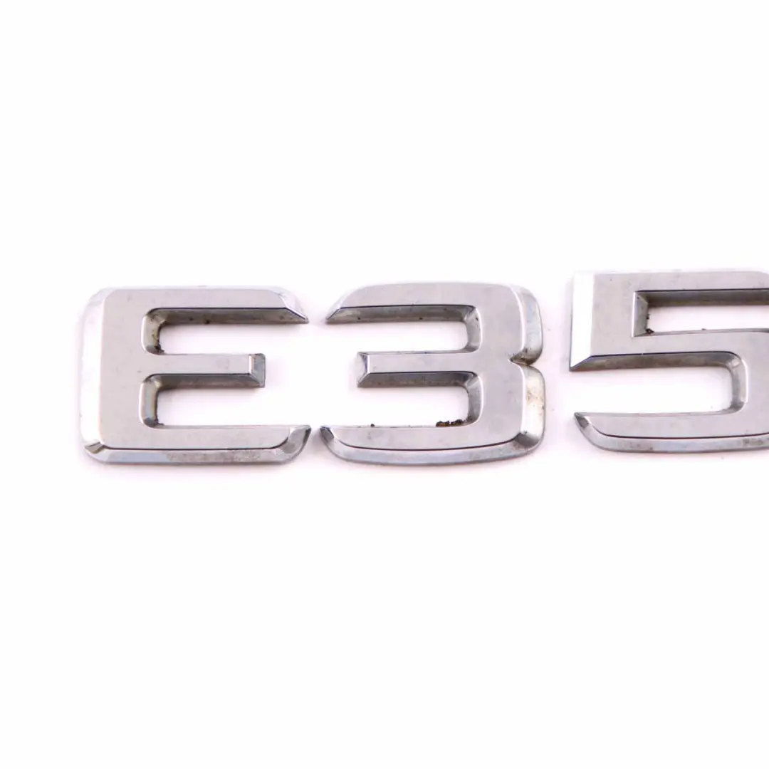 Emblem Lettering Rear Trunk Tailgate Adhered E350 to Mercedes W211 W212 with Part number A2118170315 Mercedes W211 W212 Emblem Lettering Rear Trunk Tailgate Adhered E350 - SKU A2118170315 - Part number A2118170315