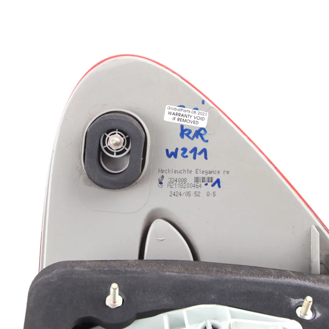 Right O/S Tail Light Lamp Side Panel to Mercedes W211 Rear with Part number A2118200464 Mercedes W211 Rear Right O/S Tail Light Lamp Side Panel - SKU A2118200464-1 - Part number A2118200464