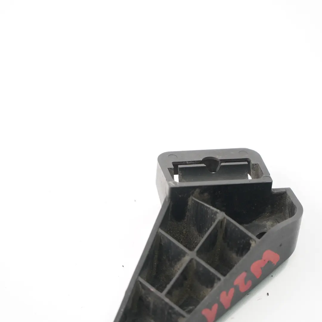 Uchwyt Mocowanie Spryskiwacza Reflektorów do Mercedes W211 o numerze A2118690214 Mercedes W211 Uchwyt Mocowanie Spryskiwacza Reflektorów - SKU A2118690214 - Numer Części A2118690214