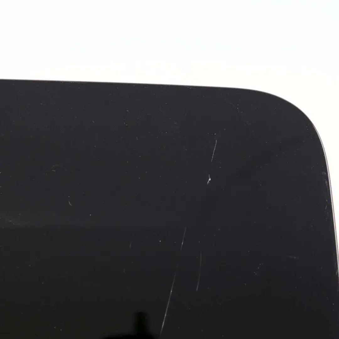 Flap Tank Cap Cover Obsidian Black 197 to Mercedes W212 Fuel with Part number A2127570006 Mercedes W212 Fuel Flap Tank Cap Cover Obsidian Black 197 - SKU A2127570006-OB - Part number A2127570006