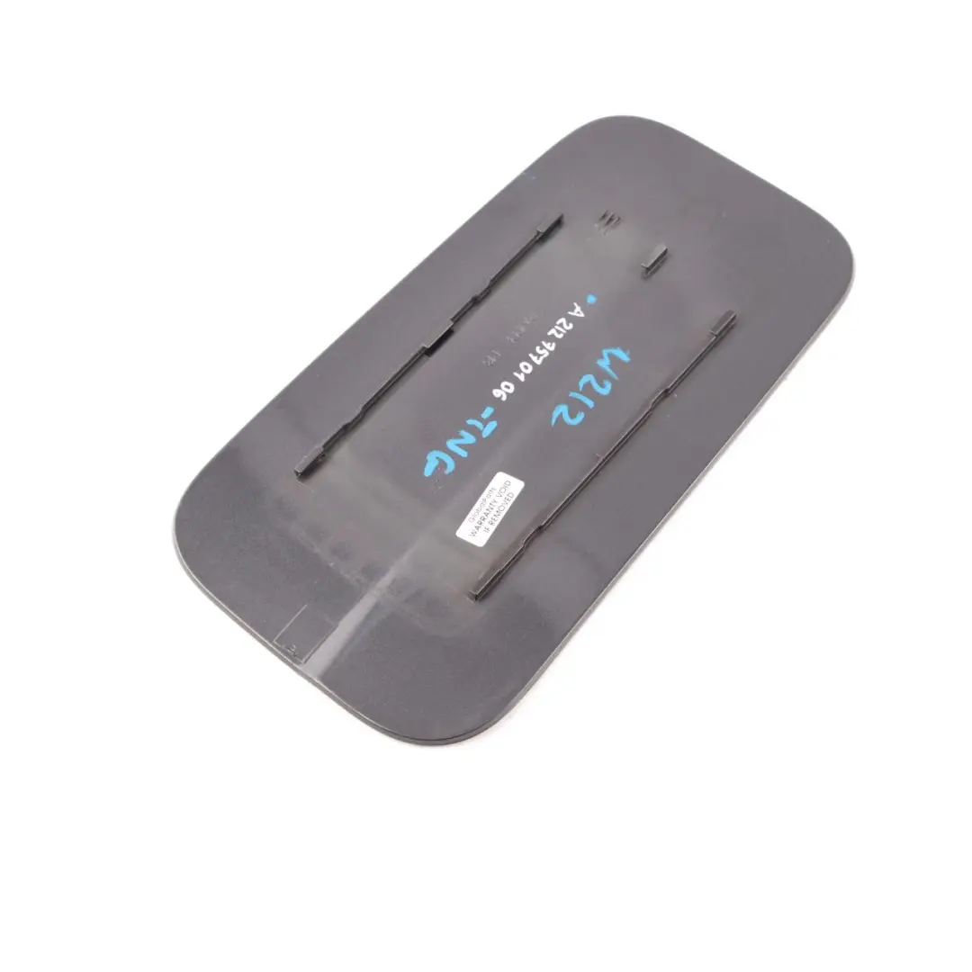 Flap Cover Filler Fill In Flap Tenorite Grey Metallic - 755 to Mercedes W212 Fuel with Part number A2127570106 Mercedes W212 Fuel Flap Cover Filler Fill In Flap Tenorite Grey Metallic - 755 - SKU A2127570106-TNG - Part number A2127570106