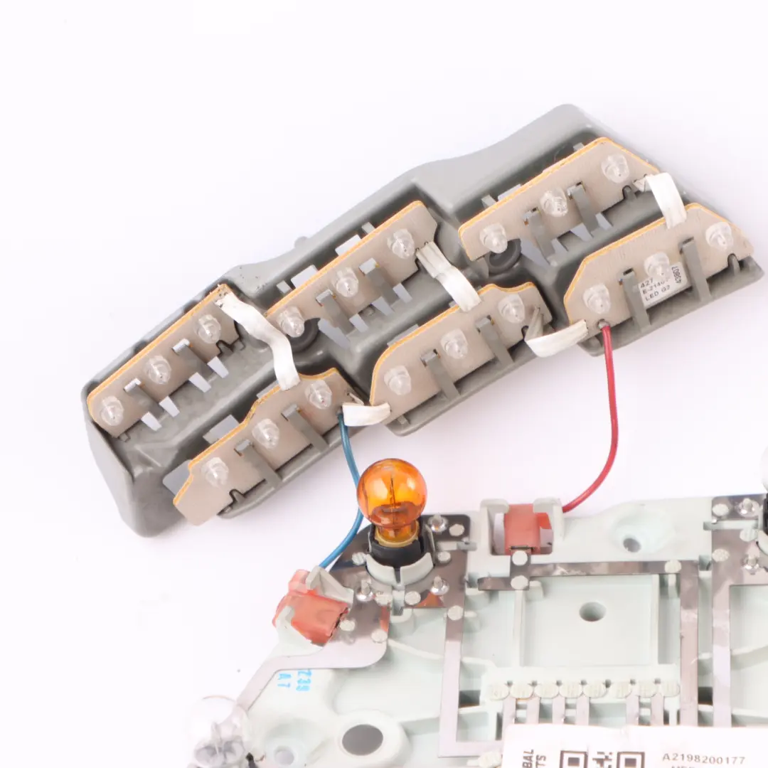 Bulb Holder Mercedes C219 CLS 320 Coupe Sedan Rear Lamp Left N/S Bulb Mount to with Part number A2198200177 Bulb Holder Mercedes C219 CLS 320 Coupe Sedan Rear Lamp Left N/S Bulb Mount - SKU A2198200177 - Part number A2198200177