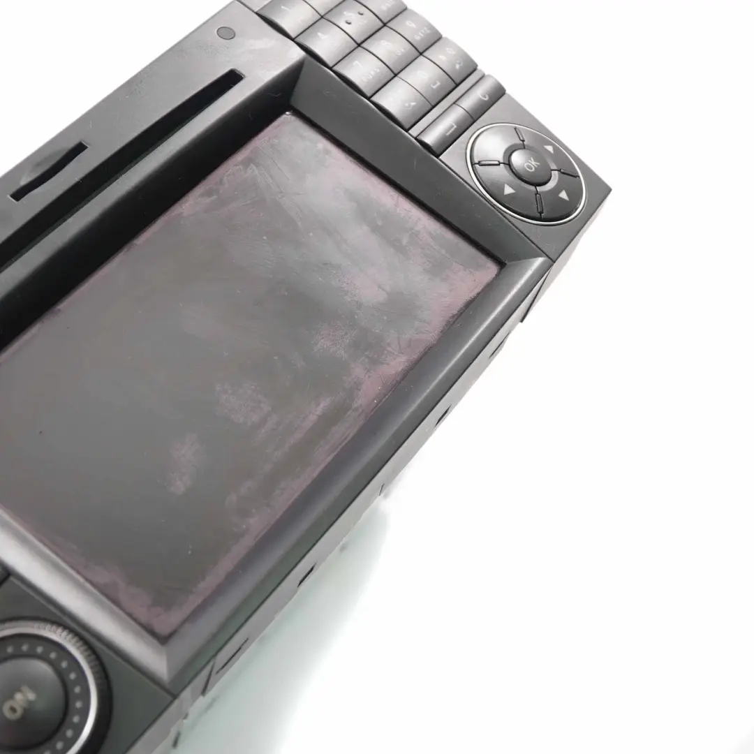 W219 Unité de tête CD Player Radio Navi COMAND pour Mercedes à propos du numéro de pièce A2199001100 Mercedes W219 Unité de tête CD Player Radio Navi COMAND - SKU A2199001100 - Numéro de pièce A2199001100