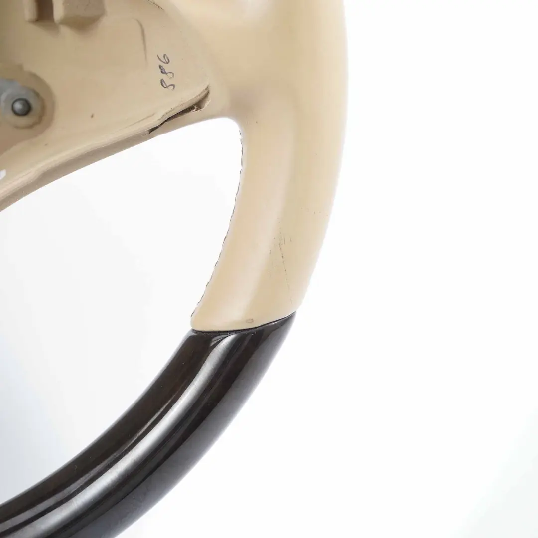 W219 CLS Beige Leather Steering Wheel Dark Walnut to Mercedes with Part number A2304602776 Mercedes W219 CLS Beige Leather Steering Wheel Dark Walnut - SKU A2304602776 - Part number A2304602776