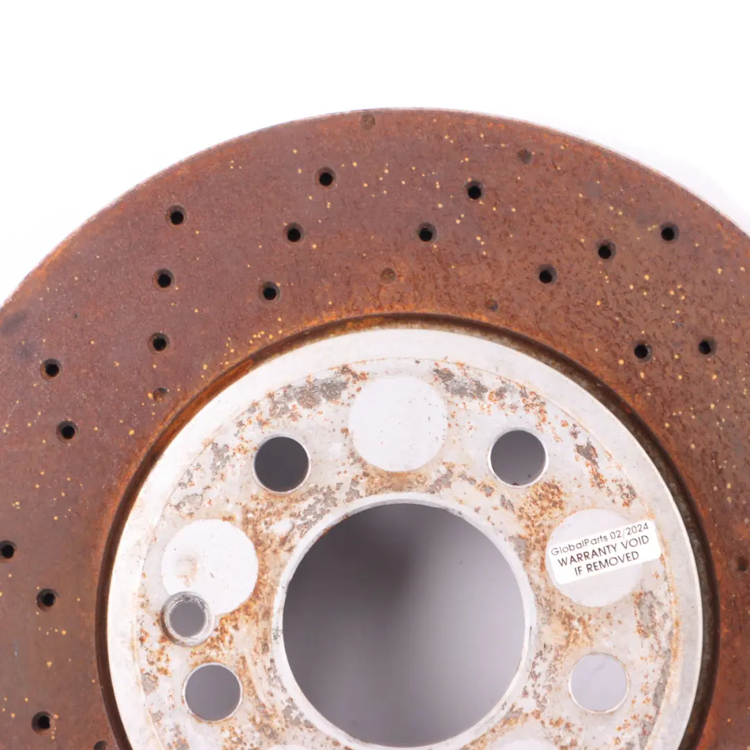 Disque de frein AMG Avant Gauche Droite Roue Perforée pour Mercedes W176 W246 à propos du numéro de pièce A2464212512 Mercedes W176 W246 Disque de frein AMG Avant Gauche Droite Roue Perforée - SKU A2464212512 - Numéro de pièce A2464212512