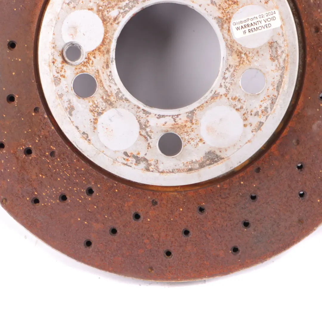 Disque de frein AMG Avant Gauche Droite Roue Perforée pour Mercedes W176 W246 à propos du numéro de pièce A2464212512 Mercedes W176 W246 Disque de frein AMG Avant Gauche Droite Roue Perforée - SKU A2464212512 - Numéro de pièce A2464212512