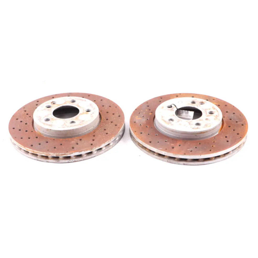 Brake Disc Set AMG Front Left Right Wheel Perforated to Mercedes W176 W246 with Part number A2464212512 Mercedes W176 W246 Brake Disc Set AMG Front Left Right Wheel Perforated - SKU A2464212512 - Part number A2464212512
