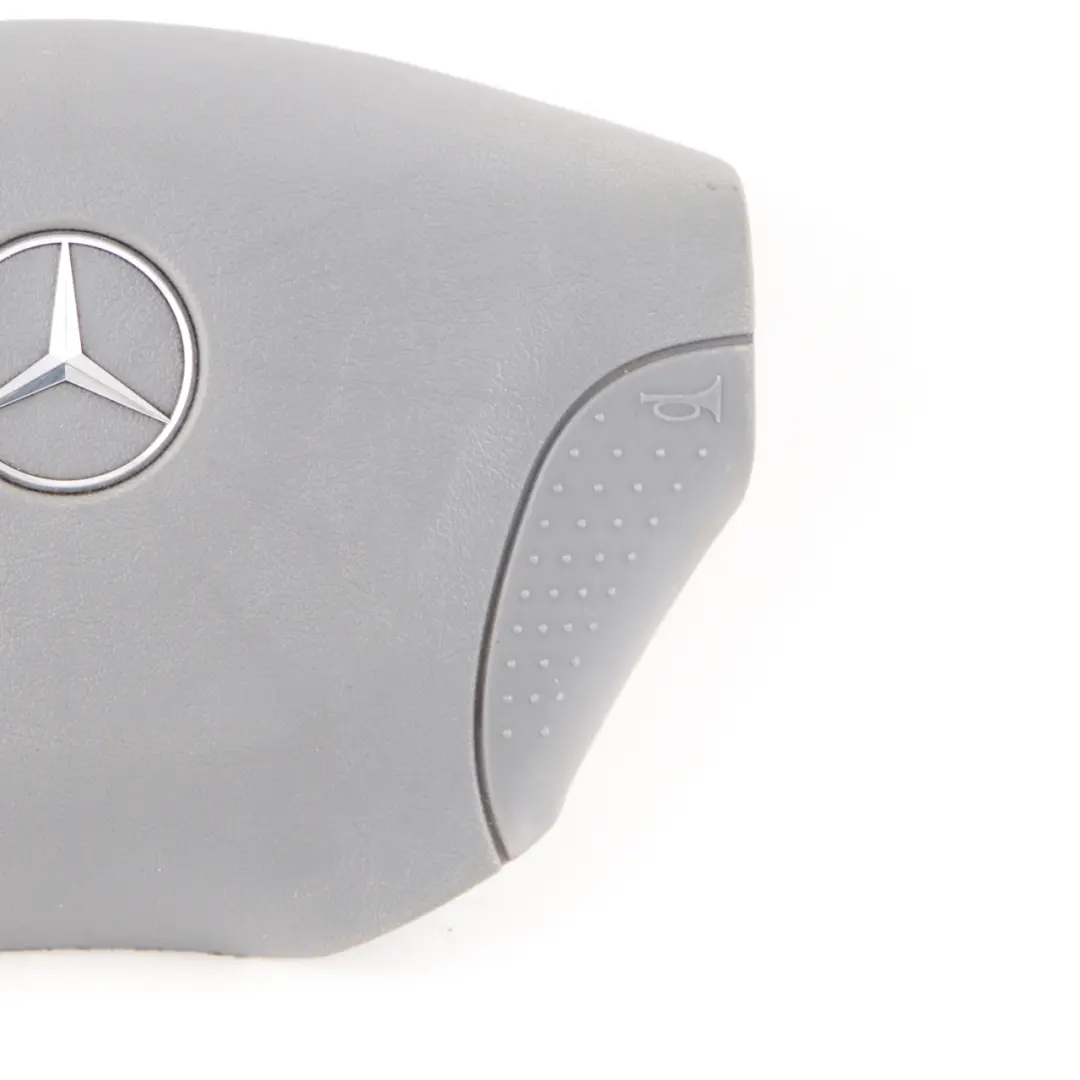 Embellecedor Volante Mercedes W901 W903 Tapa Panel Gris para con número de pieza A9014640131 Embellecedor Volante Mercedes W901 W903 Tapa Panel Gris - SKU A9014640131 - Número de pieza A9014640131