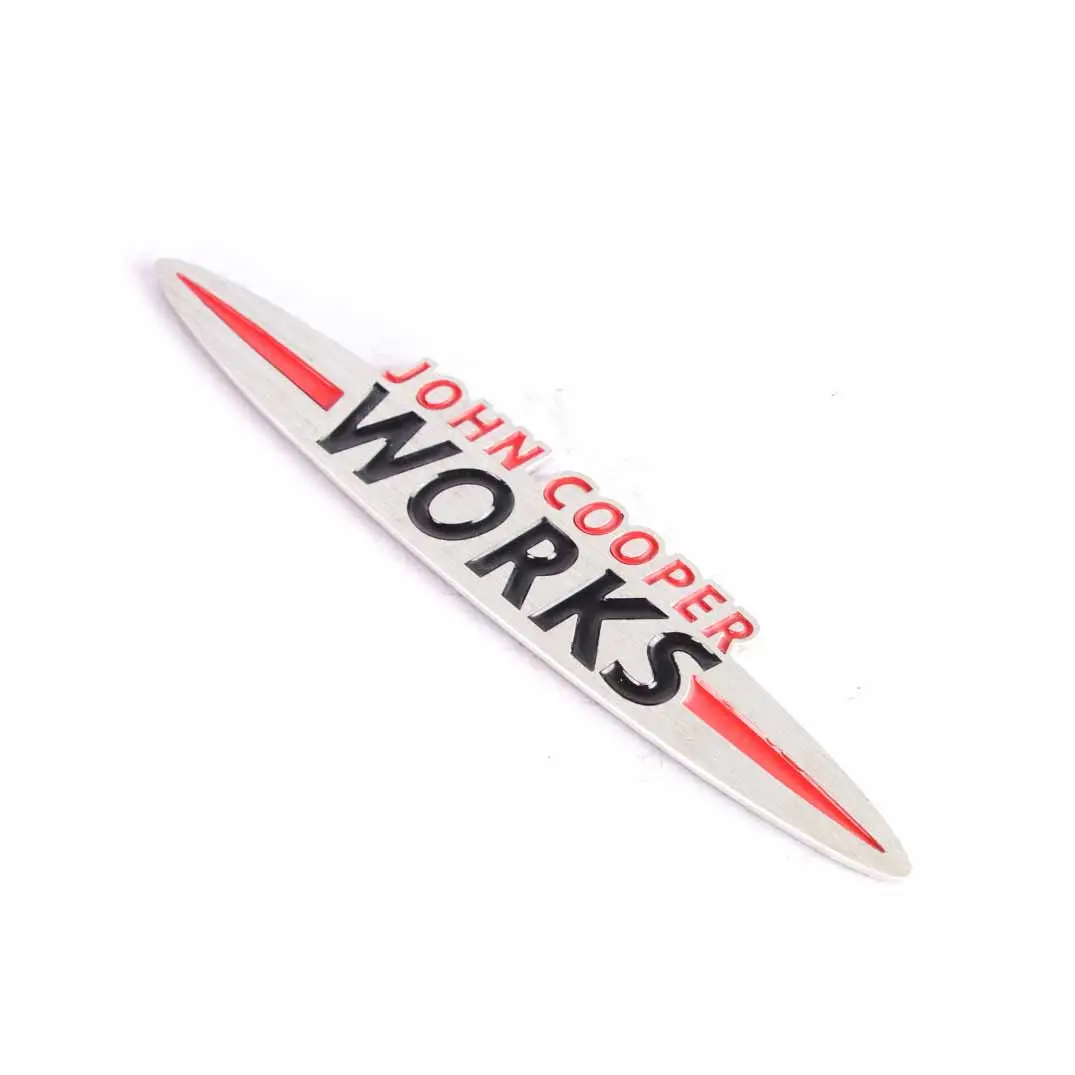 Stamp Badge Trim to Mini Cooper S John Cooper Works Logo with Part number JCW Emblem Mini Cooper S John Cooper Works Logo Stamp Badge Trim - SKU JCW Emblem-3 - Part number JCW Emblem