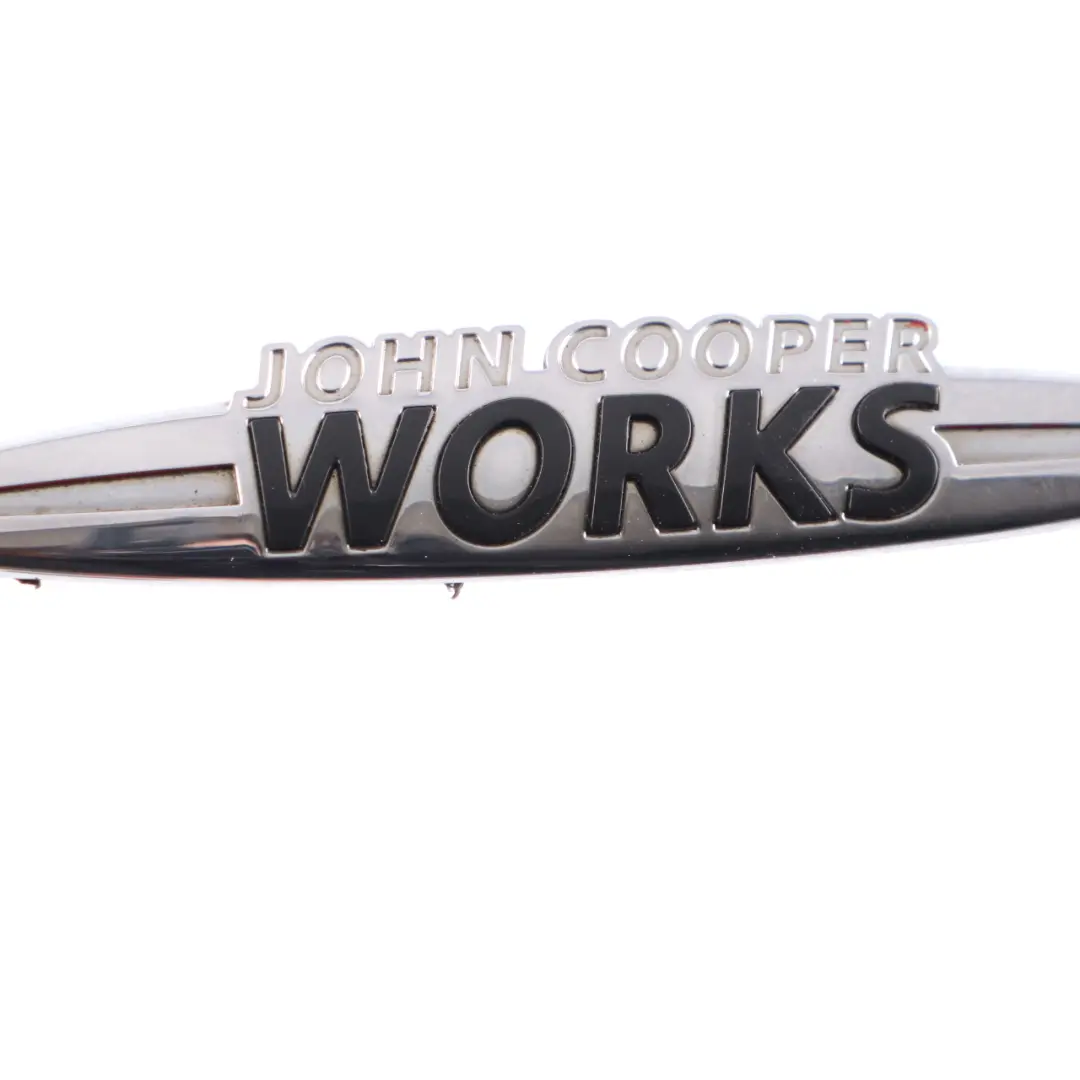 Stamp Badge Trim to Mini Cooper S John Cooper Works Logo with Part number JCW Emblem Mini Cooper S John Cooper Works Logo Stamp Badge Trim - SKU JCW-Emblem-4 - Part number JCW Emblem