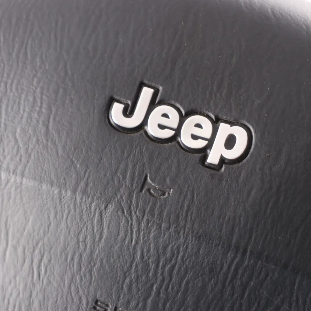 Steering Wheel Air Module Driver's Side Black to Jeep Grand Cherokee WJ with Part number P5GV61XDVAC Jeep Grand Cherokee WJ Steering Wheel Air Module Driver's Side Black - SKU P5GV61XDVAC - Part number P5GV61XDVAC