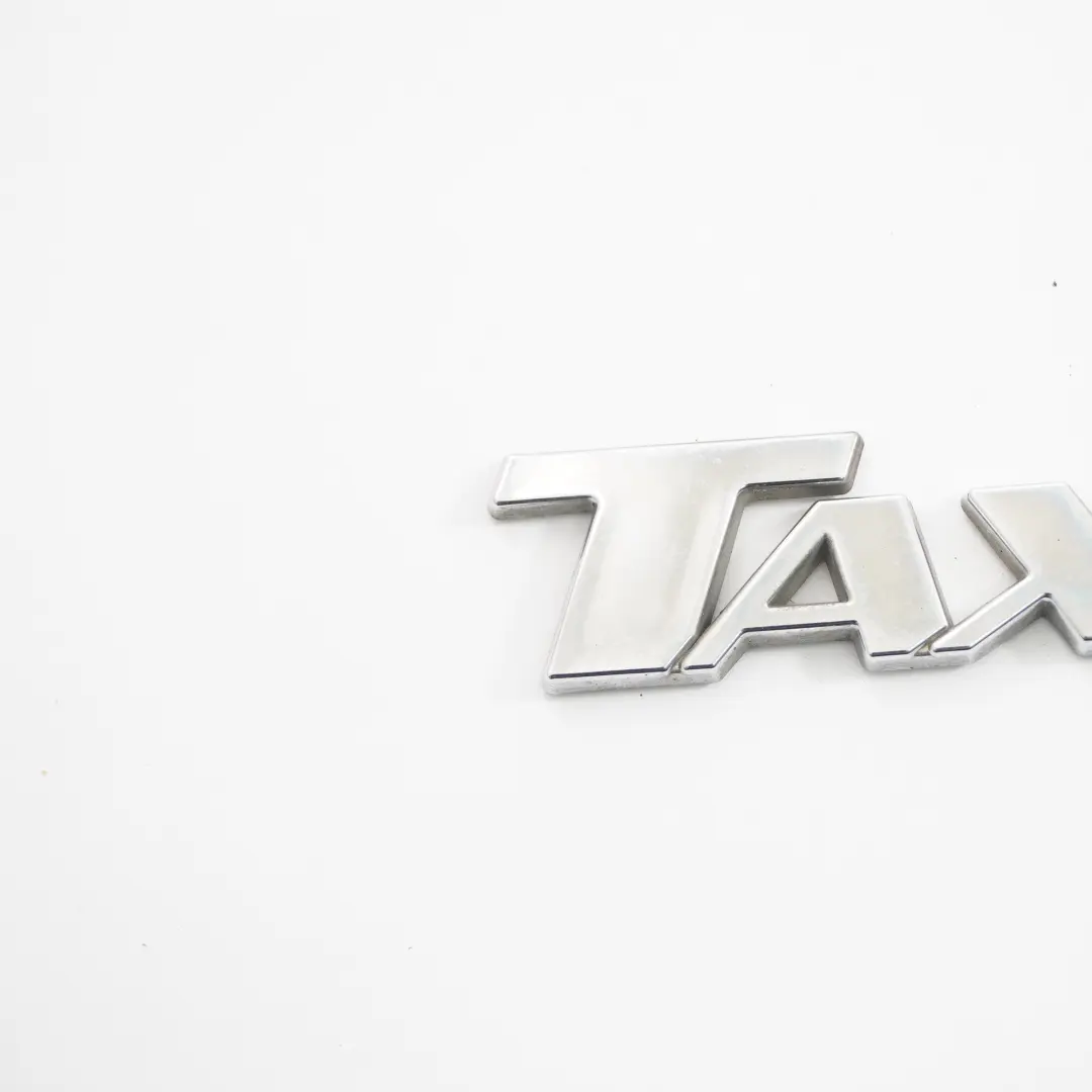 Adhered Lettering Logo to Mercedes W639 with Part number TAXI Emblem Mercedes W639 Adhered Lettering Logo - SKU TAXI Emblem - Part number TAXI Emblem